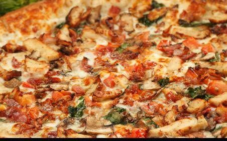 Close-up of a chicken and pepper pizza baked at Express Pizzeria