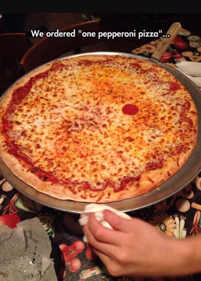 A large pepperoni pizza fresh from the oven at Express Pizzeria